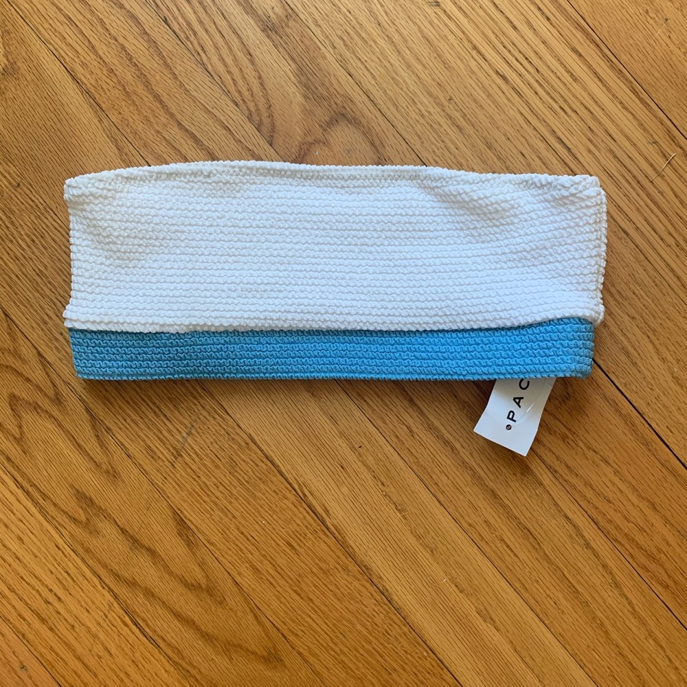 white and blue strapless swim top